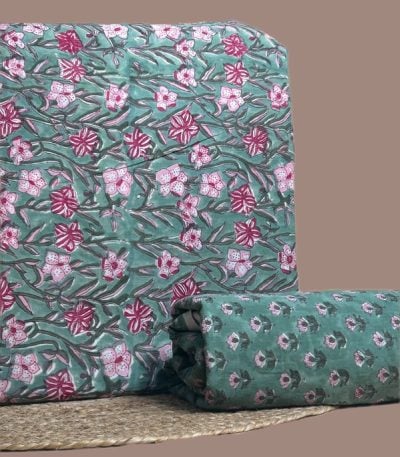 This 2pc unstitched fabric set includes a Blockprinted Soft Cotton top and matching bottom fabric in a large floral with a coordinating small-scale floral design. Soft
