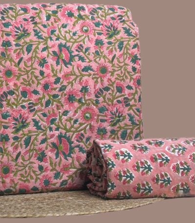 This 2pc unstitched fabric set includes a Blockprinted Soft Cotton top and matching bottom fabric in a large floral with a coordinating small-scale floral design. Soft