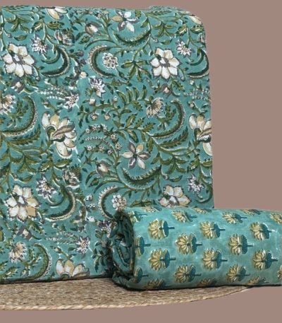 This 2pc unstitched fabric set includes a Blockprinted Soft Cotton top and matching bottom fabric in a white floral vine with a coordinating small-scale floral design. Soft