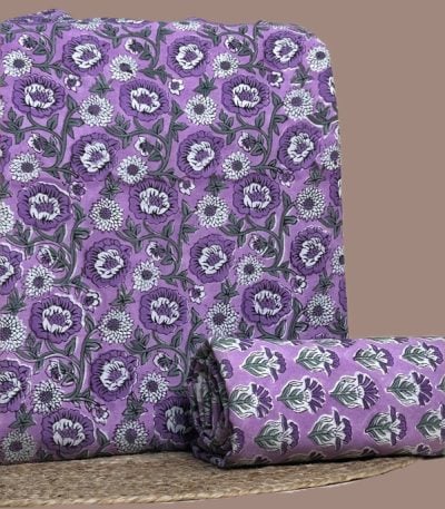 This 2pc unstitched fabric set includes a Blockprinted Soft Cotton top and matching bottom fabric in a violet floral with a coordinating small-scale floral design. Soft