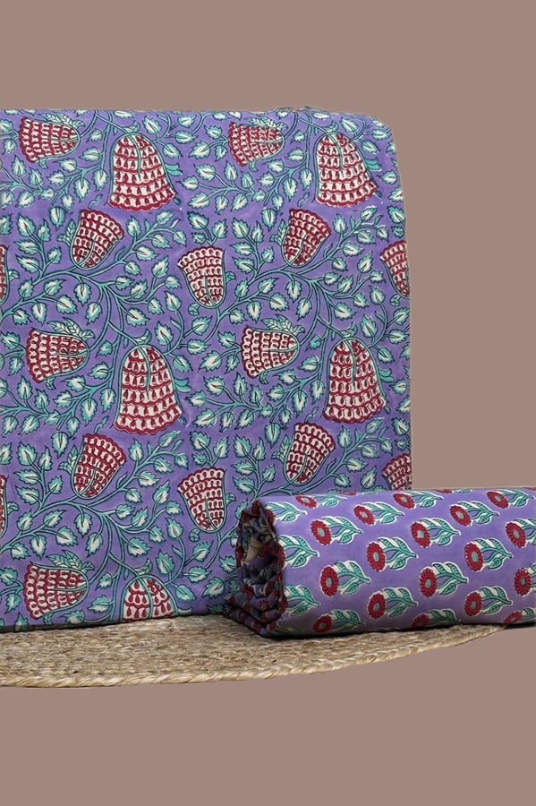 Purple - 2pc Blockprinted Soft Cotton Top and Bottom Fabric Set This 2pc unstitched fabric set includes a Blockprinted Soft Cotton top and matching bottom fabric in a bell-shaped floral with a coordinating floral print design. Soft