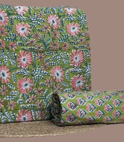 This 2pc unstitched fabric set includes a Blockprinted Soft Cotton top and matching bottom fabric in a daisy floral in pink and white design. Soft