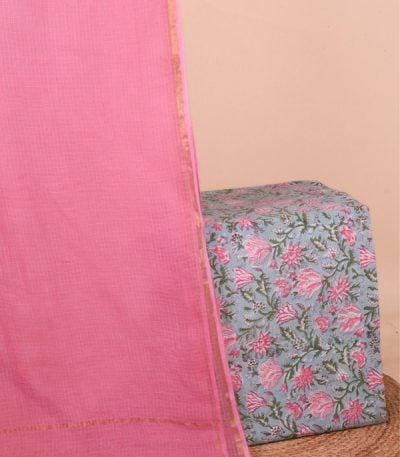 This 2pc unstitched fabric set features a soft