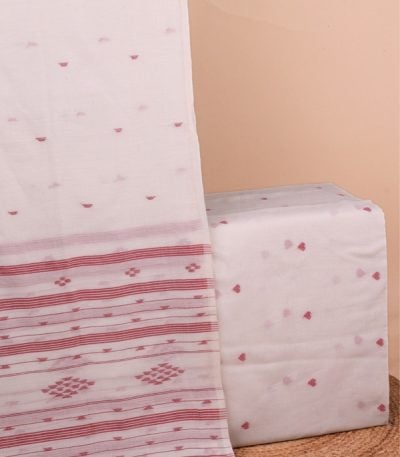 This 2pc unstitched fabric set features a soft