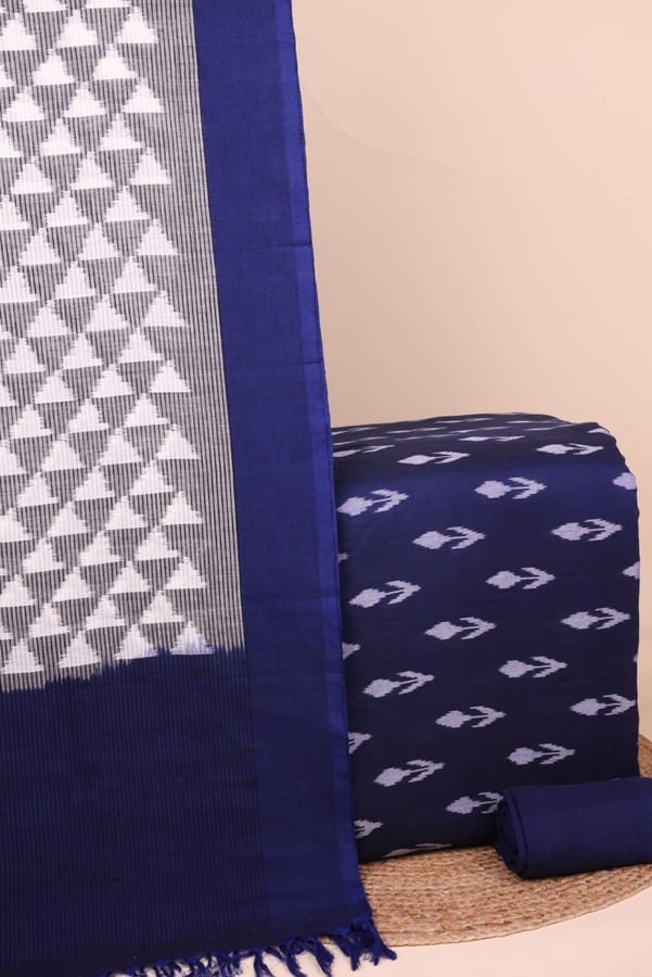 Blue - 3pc Ikkat Dupatta with Ikkat Top & Plain Handloom Cotton Bottom Set This 3pc unstitched fabric set features an Ikkat-weave dupatta with a woven border and tasseled fringe