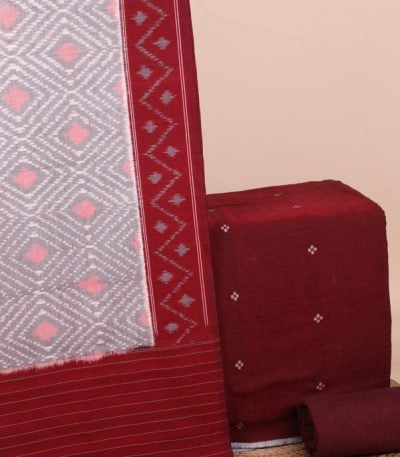 This 3pc unstitched fabric set features an Ikkat-weave dupatta with a woven border and tasseled fringe