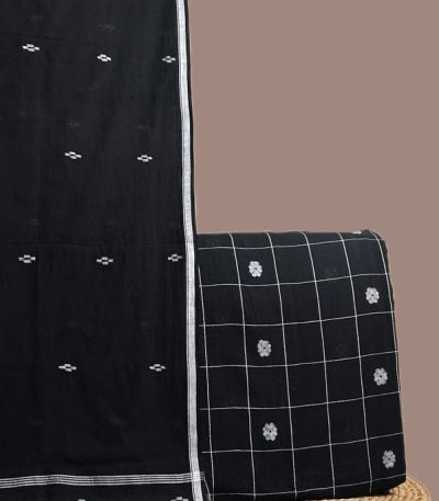 This black unstitched suit fabric set includes a 2.50 metre Handloom Cotton dupatta paired with a 2.50 metre Handloom Woven Design Cotton top fabric. Ideal for custom tailoring into your preferred silhouette.