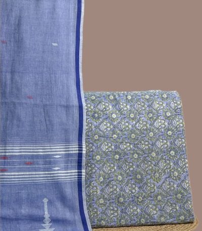 This blue unstitched suit fabric set includes a 2.50 metre Handloom Cotton dupatta paired with a 2.50 metre Blockprint Soft Cotton top fabric. Ideal for custom tailoring into your preferred silhouette. [Internal note: Colour proposed as Blue from the dupatta/top tones described earlier - please confirm.]