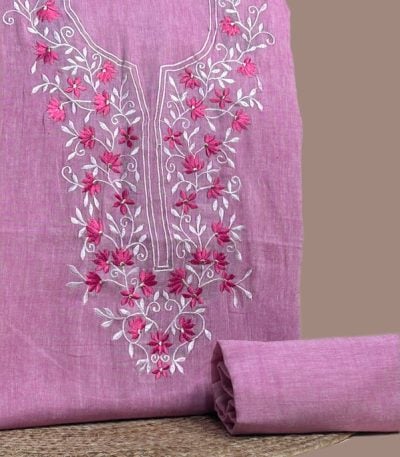 This pink handloom soft cotton set features intricate embroidered neckline detailing on the top (3 metres) with a matching solid bottom (2.50 metres). No dupatta included in this set.