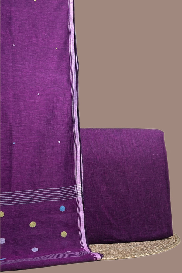 This purple unstitched suit fabric set includes a 2.50 metre Handloom Cotton dupatta paired with a 2.50 metre Handloom Cotton top fabric. Ideal for custom tailoring into your preferred silhouette.
