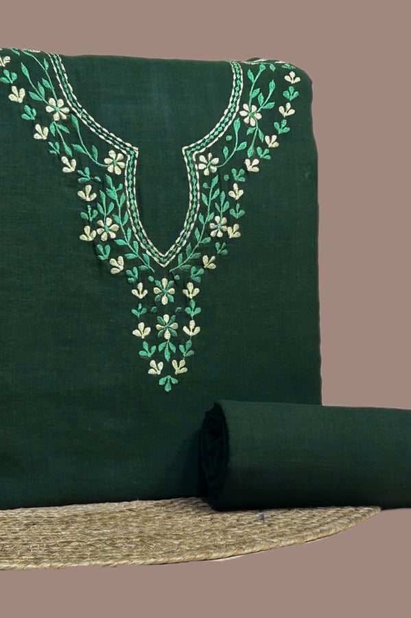 This green handloom soft cotton set features intricate embroidered neckline detailing on the top (3 metres) with a matching solid bottom (2.50 metres). No dupatta included in this set.