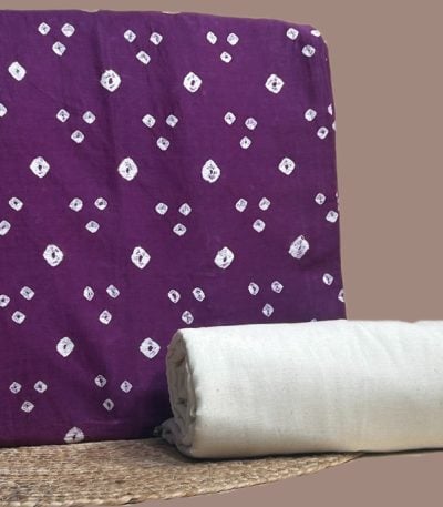 This purple unstitched fabric set includes a 2.50 metre Bandhani Cotton top and a 2.50 metre Handloom Cotton bottom. No dupatta included in this set.