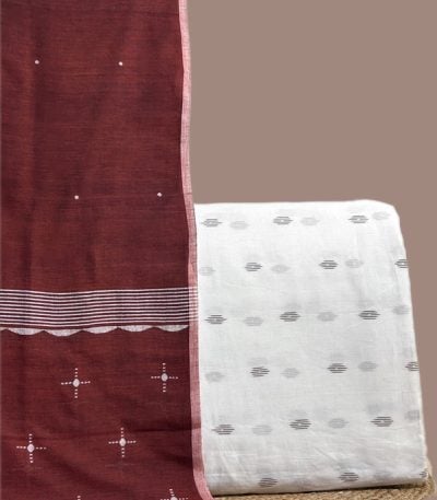 This white unstitched suit fabric set includes a 2.50 metre Handloom Cotton dupatta paired with a 2.50 metre Handloom Ikkat top fabric. Ideal for custom tailoring into your preferred silhouette.