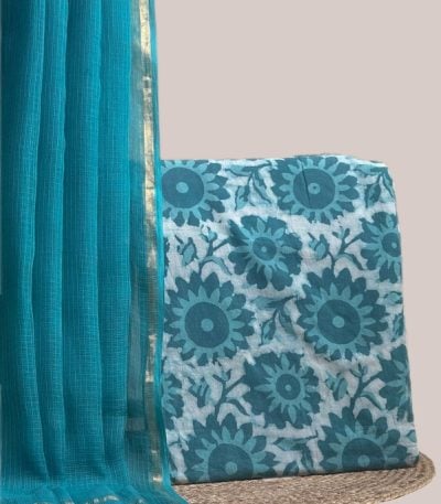 This blue unstitched suit fabric set includes a 2.50 metre AirLoom™ Kota dupatta paired with a 2.50 metre Blockprint Soft Cotton top fabric. Ideal for custom tailoring into your preferred silhouette.
