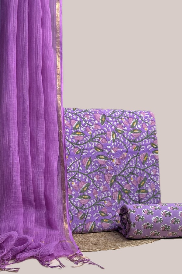 This purple unstitched three-piece suit fabric set includes a 2.50 metre AirLoom™ Kota dupatta