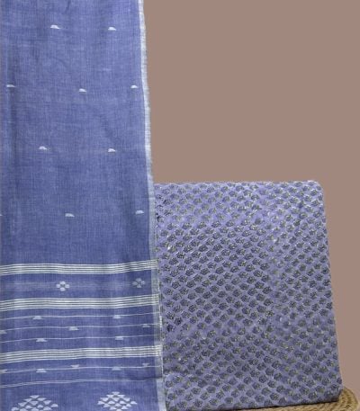 This blue unstitched suit fabric set includes a 2.50 metre Handloom Cotton dupatta paired with a 2.50 metre Blockprint Soft Cotton top fabric. Ideal for custom tailoring into your preferred silhouette.