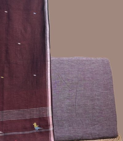 This red unstitched suit fabric set includes a 2.50 metre Handloom Cotton dupatta paired with a 2.50 metre Handloom Cotton Stripe top fabric. Ideal for custom tailoring into your preferred silhouette.