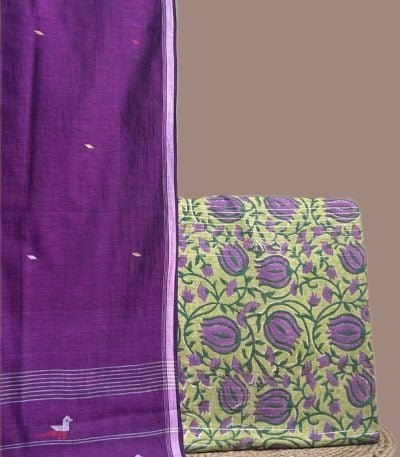 This purple unstitched suit fabric set includes a 2.50 metre Handloom Cotton dupatta paired with a 2.50 metre Blockprint Soft Cotton top fabric. Ideal for custom tailoring into your preferred silhouette.