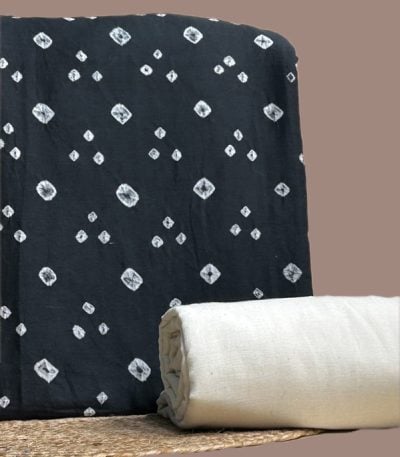 This black unstitched fabric set includes a 2.50 metre Bandhani Cotton top and a 2.50 metre Handloom Cotton bottom. No dupatta included in this set.