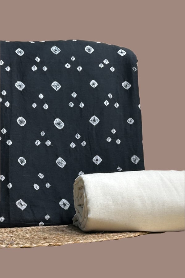 This black unstitched fabric set includes a 2.50 metre Bandhani Cotton top and a 2.50 metre Handloom Cotton bottom. No dupatta included in this set.