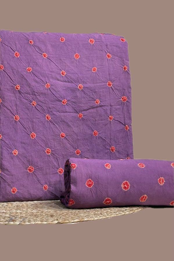 This purple unstitched fabric set includes a 2.50 metre Bandhani Cotton top and a 2.50 metre Bandhani Cotton bottom. No dupatta included in this set.