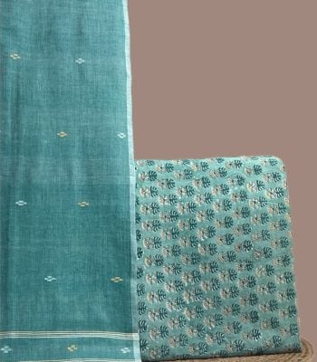 This green unstitched suit fabric set includes a 2.50 metre Handloom Cotton dupatta paired with a 2.50 metre Blockprint Soft Cotton top fabric. Ideal for custom tailoring into your preferred silhouette.