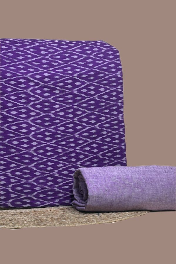 A purple handwoven Ikkat top fabric with a coordinating solid handloom cotton bottom
