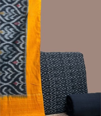 A black three piece set — handwoven Ikkat dupatta