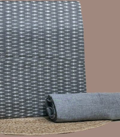 A gray handwoven Ikkat top fabric with a coordinating solid handloom cotton bottom