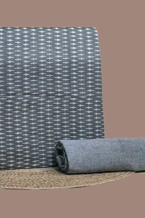 A gray handwoven Ikkat top fabric with a coordinating solid handloom cotton bottom
