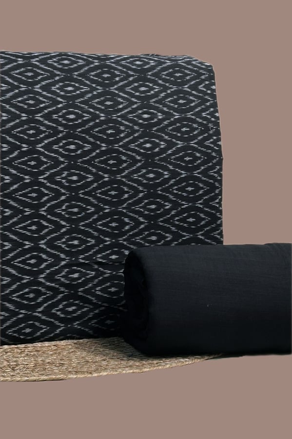 A black handwoven Ikkat top fabric with a coordinating solid handloom cotton bottom