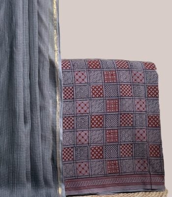 A gray set pairing a sheer AirLoom™ Kota dupatta with a hand blockprinted soft cotton top fabric