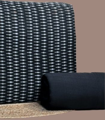 A black handwoven Ikkat top fabric with a coordinating solid handloom cotton bottom
