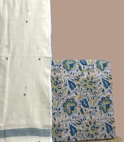 A white set pairing a handwoven Handloom dupatta with a hand blockprinted soft cotton top fabric