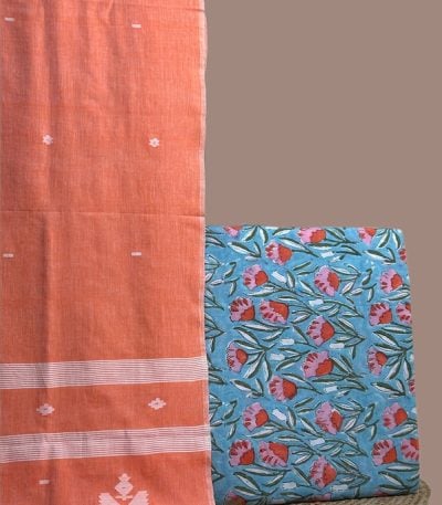 A blue set pairing a handwoven Handloom dupatta with a hand blockprinted soft cotton top fabric