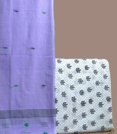A white set pairing a handwoven Handloom dupatta with a hand blockprinted soft cotton top fabric