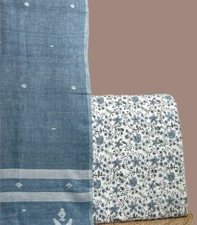 A white set pairing a handwoven Handloom dupatta with a hand blockprinted soft cotton top fabric