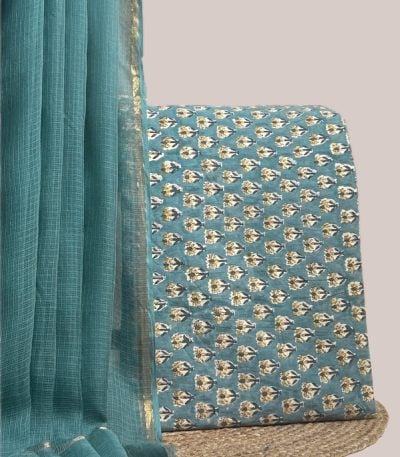A blue set pairing a sheer AirLoom™ Kota dupatta with a hand blockprinted soft cotton top fabric