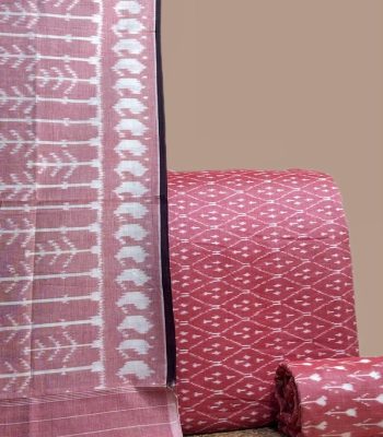 A pink three piece handwoven Ikkat set with a patterned dupatta