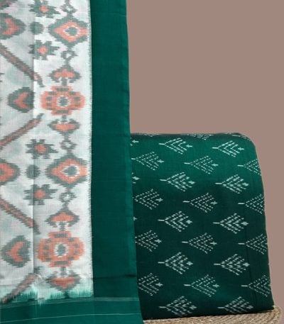 A green handwoven Ikkat set with a patterned dupatta and coordinating Ikkat top fabric