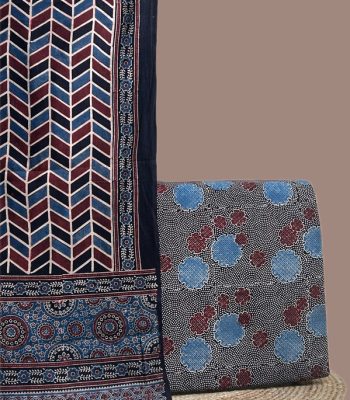 A blue Ajrakh set with a bordered printed dupatta and a coordinating Ajrakh top fabric