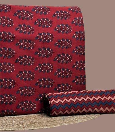 Madder red Ajrakh handblock leaf buti top with a zigzag chevron printed bottom fabric.
