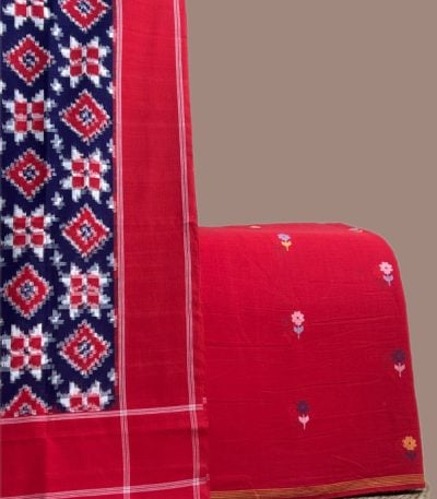 Navy and red patola Ikkat dupatta with a red multi floral jamdani woven top.