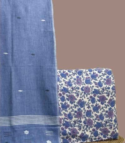 Soft blue jamdani dupatta with an ivory top blockprinted in blue and mauve blooms.
