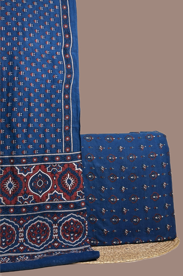 Indigo Ajrakh dupatta with madder medallion pallu and a matching indigo Ajrakh buti top.