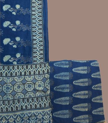 Indigo Ajrakh dupatta with ivory floral sprigs and an indigo Ajrakh leaf motif top.