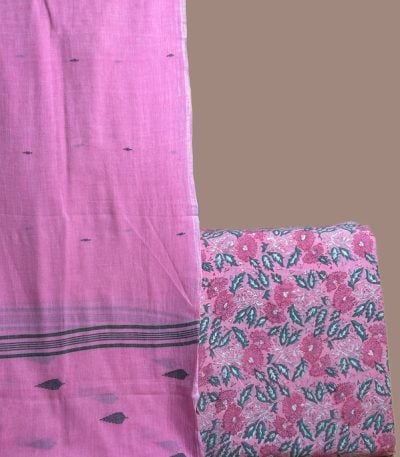 Pink handloom jamdani dupatta with grey butis and a pink dense floral blockprint top.