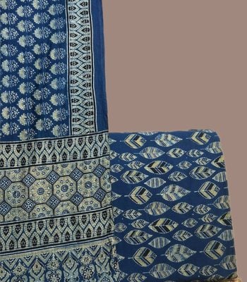 Indigo Ajrakh dupatta with ivory floral butis and an indigo Ajrakh leaf motif top.