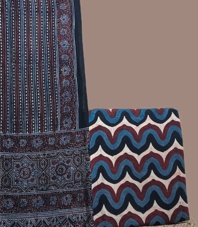 Black Ajrakh dupatta in printed stripes with madder pallu and an indigo wave print top.