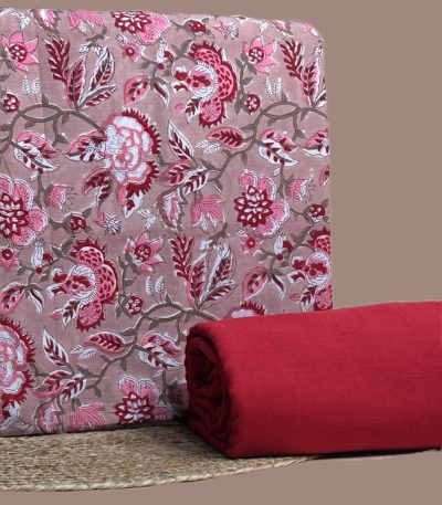 Dusty pink top blockprinted in trailing red and rose blooms
